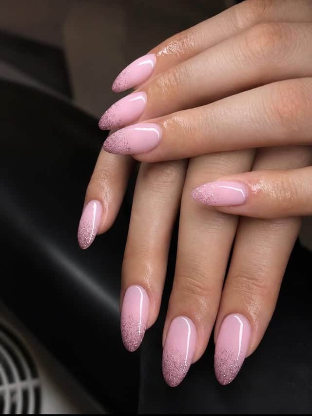 8. Pink Glitter Ombre Almond Nails - ombre nail ideas