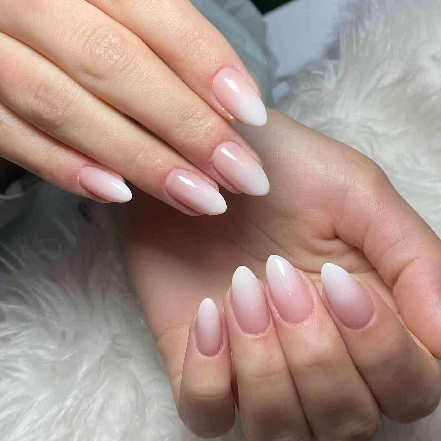 22. Milky White Almond Ombre Nails - ombre nail ideas