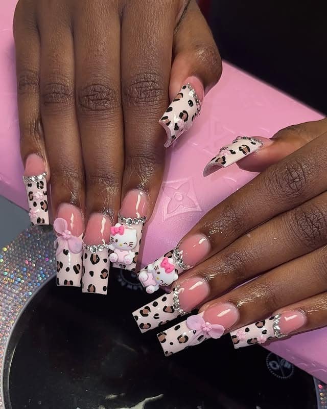 5. Pink Hello Kitty Leopard Glam Nails - cheetah nail ideas