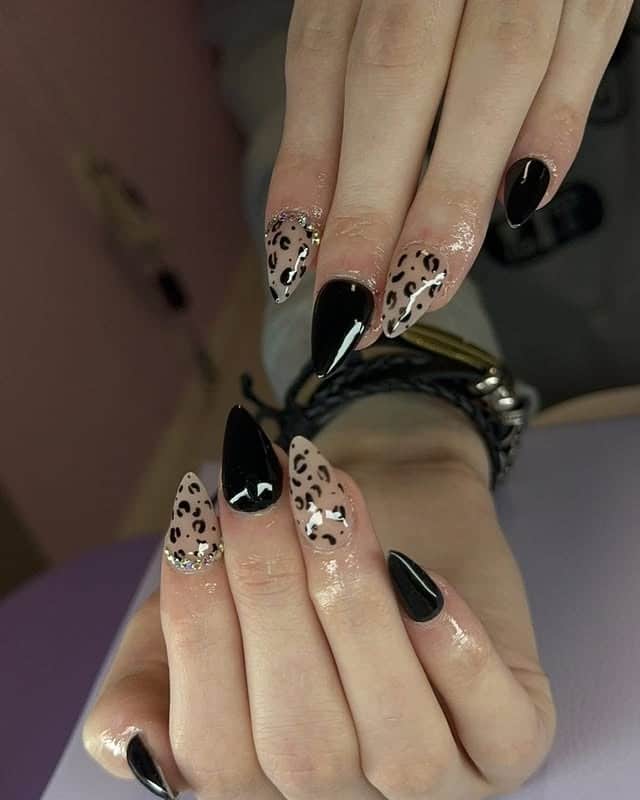 6. Black and Nude Leopard Stiletto Nails - cheetah nail ideas