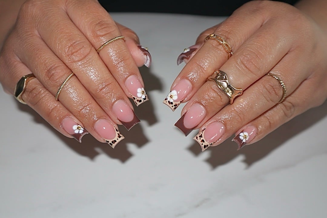 8. Brown French Leopard Flower Nails - cheetah nail ideas