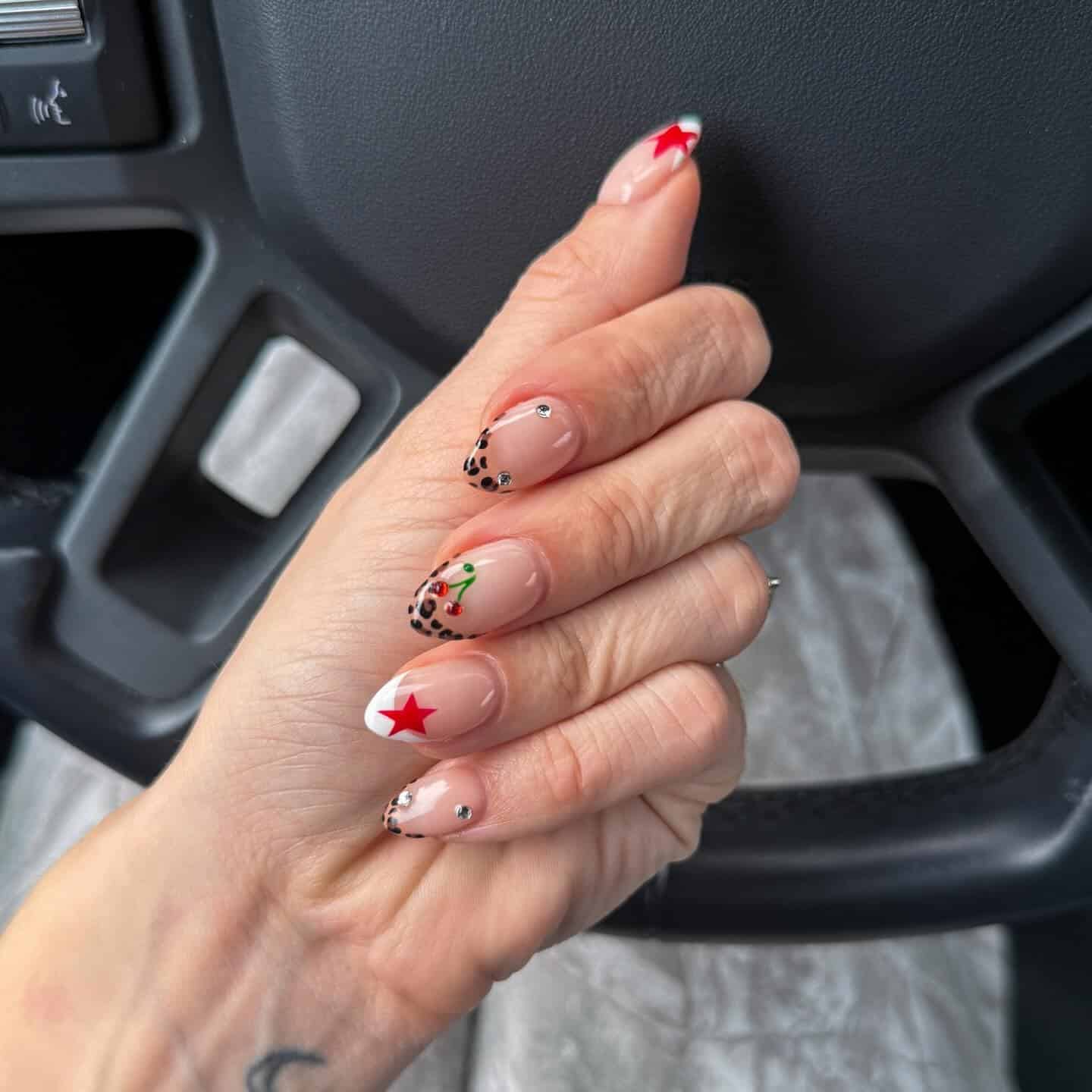 10. Cherry Star Leopard Accent Nails - cheetah nail ideas