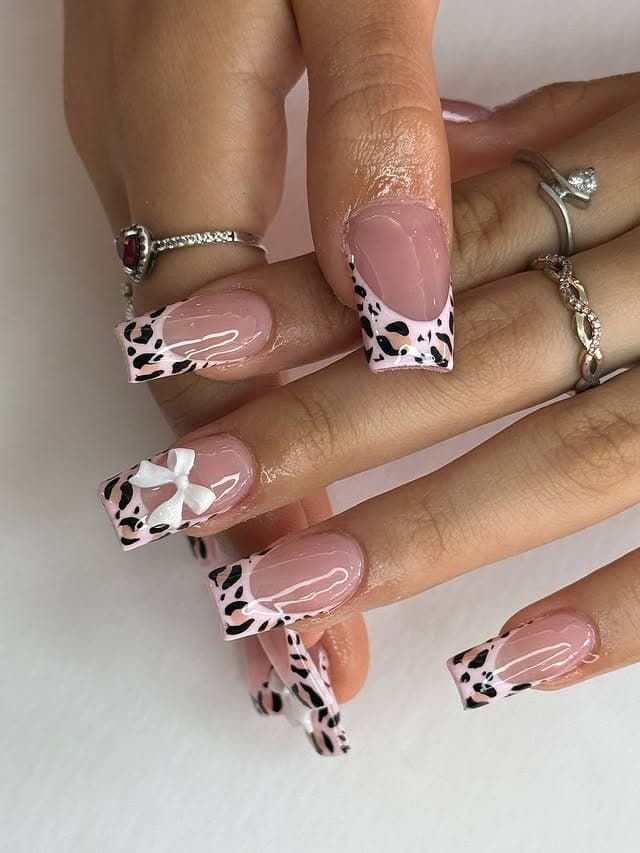 11. Soft Pink Leopard French Tip Nails - cheetah nail ideas