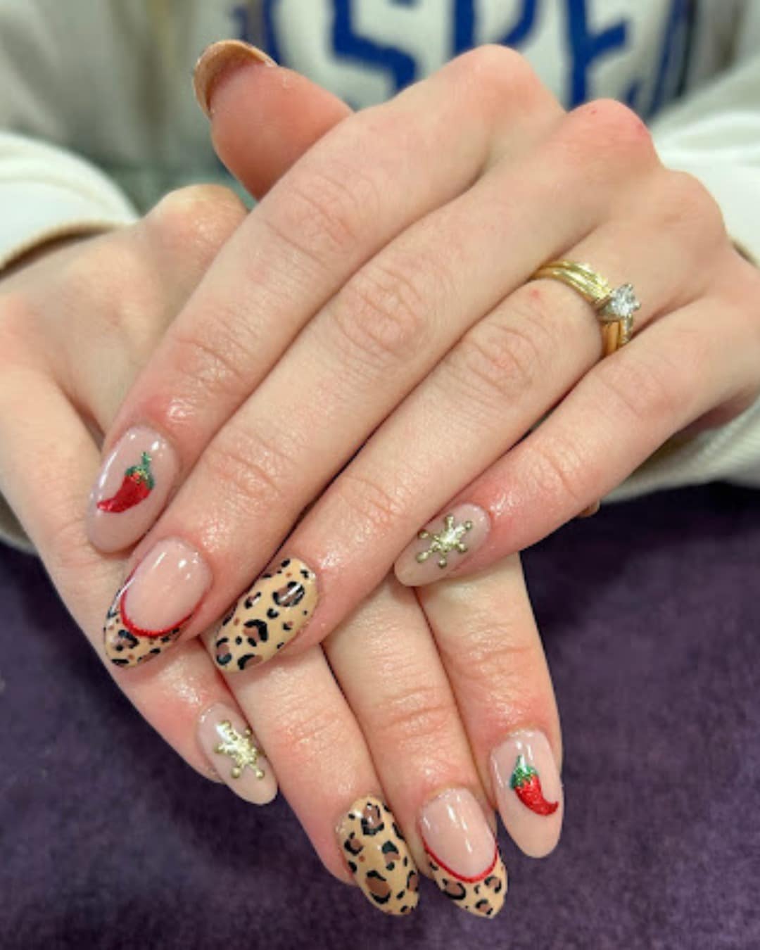 13. Leopard Print Chili Pepper Nails - cheetah nail ideas