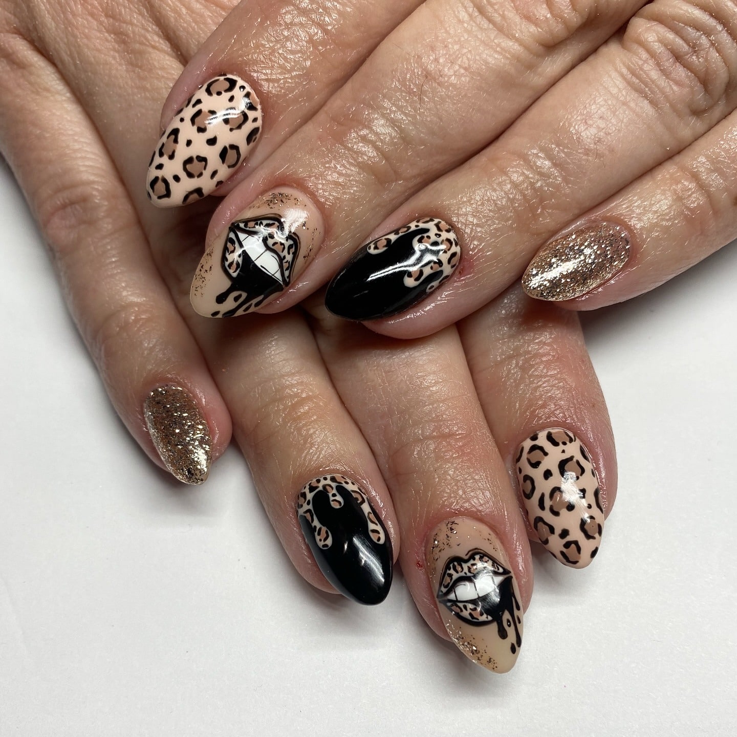 20. Nude Black Leopard Glitter Nails - cheetah nail ideas