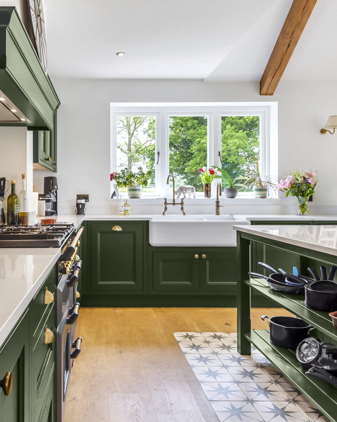 4. Forest Green Traditional Kitchen with Brass Hardware - traditional kitchen ideas