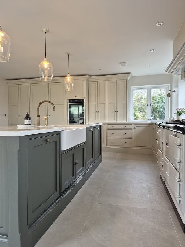 11. Sage Green Traditional Kitchen with Cream Cabinetry - traditional kitchen ideas