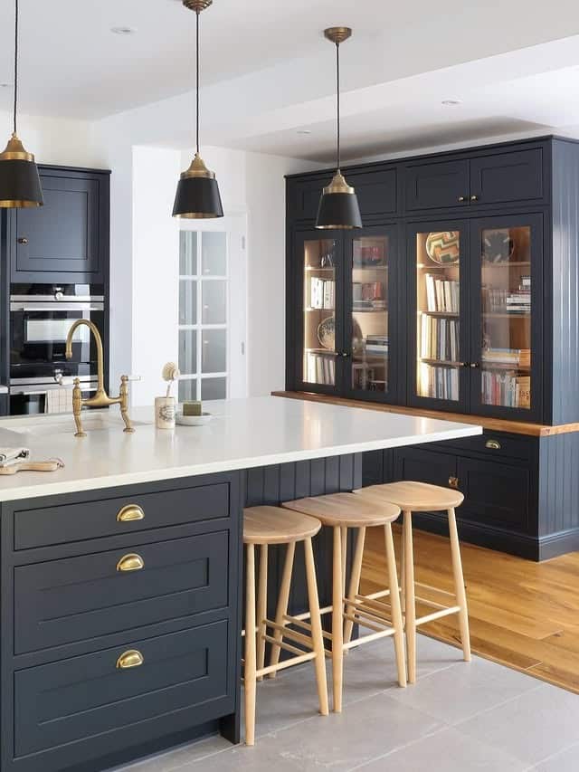 12. Midnight Blue Traditional Kitchen with Brass Accents - traditional kitchen ideas