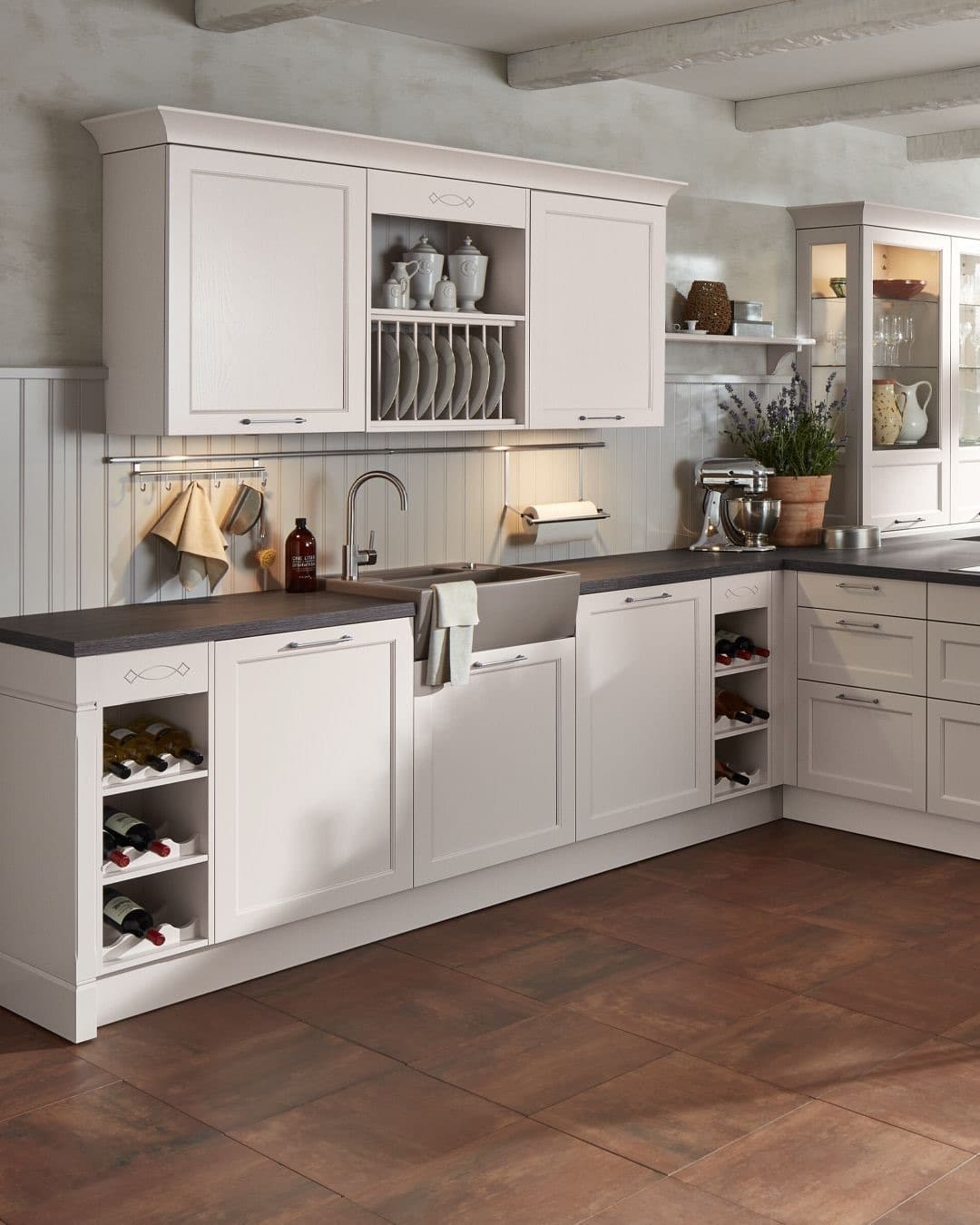14. Soft White Traditional Kitchen with Charcoal Countertops - traditional kitchen ideas