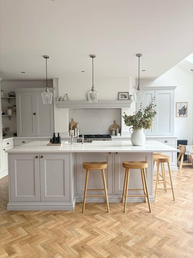 15. Light Gray Traditional Kitchen with Herringbone Flooring - traditional kitchen ideas