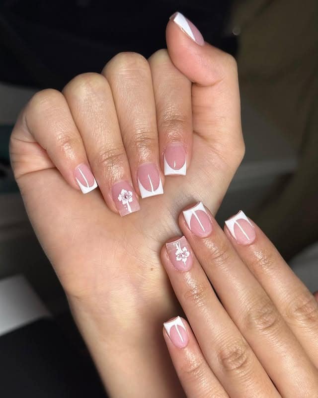 6. Minimal White French Nails with Floral Art - classy short nail ideas
