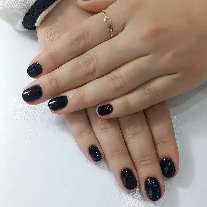 12. Short Black Glossy Nails - classy short nail ideas