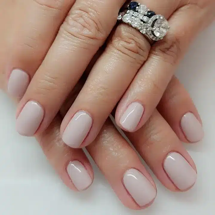 17. Soft White Short Oval Nails - classy short nail ideas