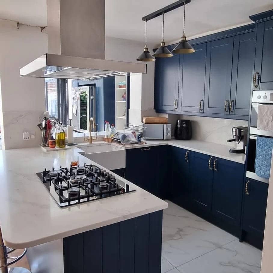 2. Classic Navy Blue Kitchen With White Quartz Counters - navy blue kitchen ideas
