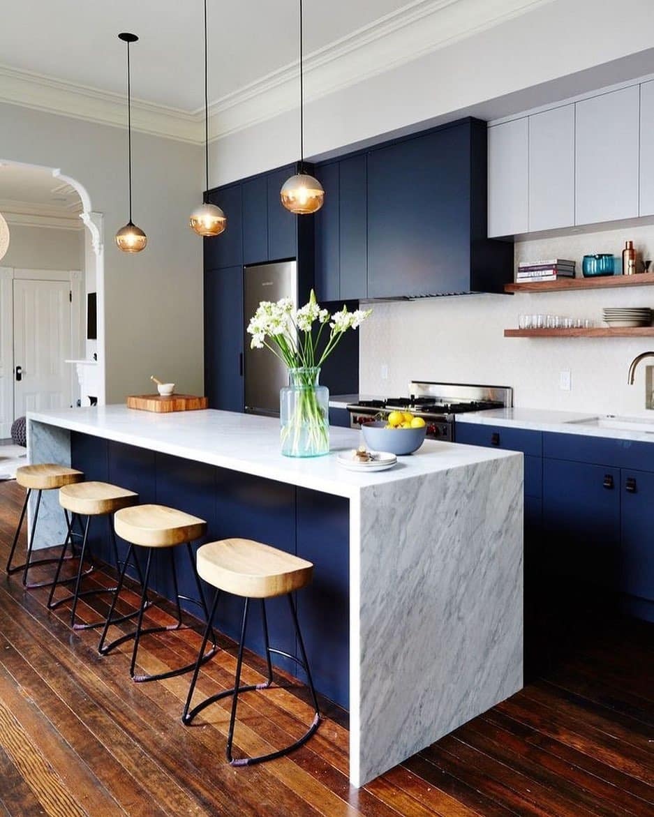 13. Modern Navy Blue Kitchen With Waterfall Marble Island - navy blue kitchen ideas