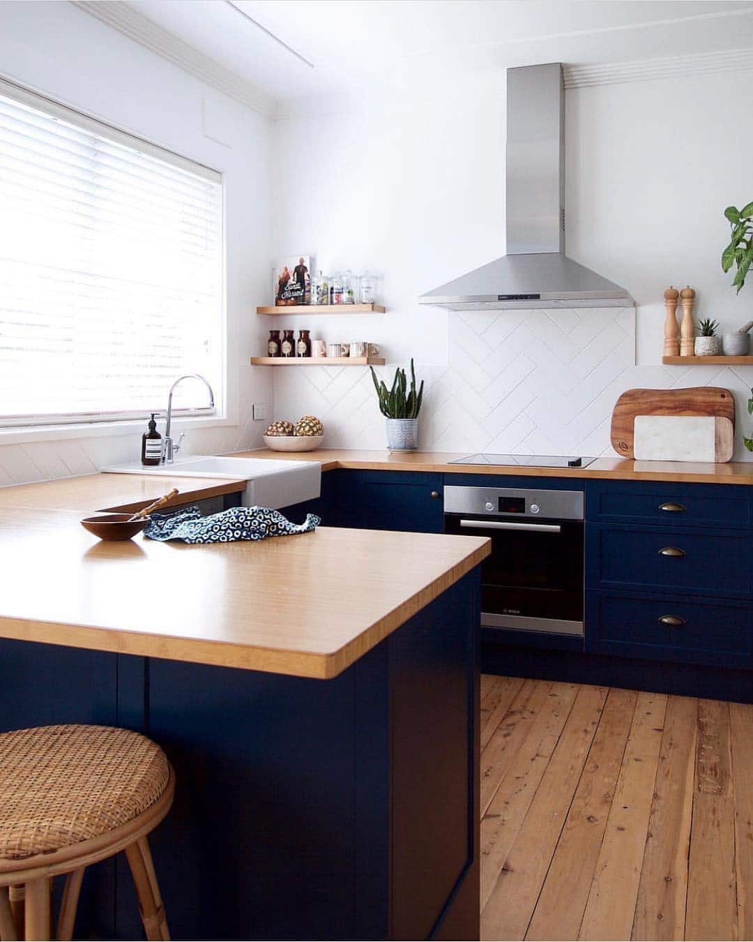 18. Scandinavian Navy Blue Kitchen With Wood Countertops - navy blue kitchen ideas