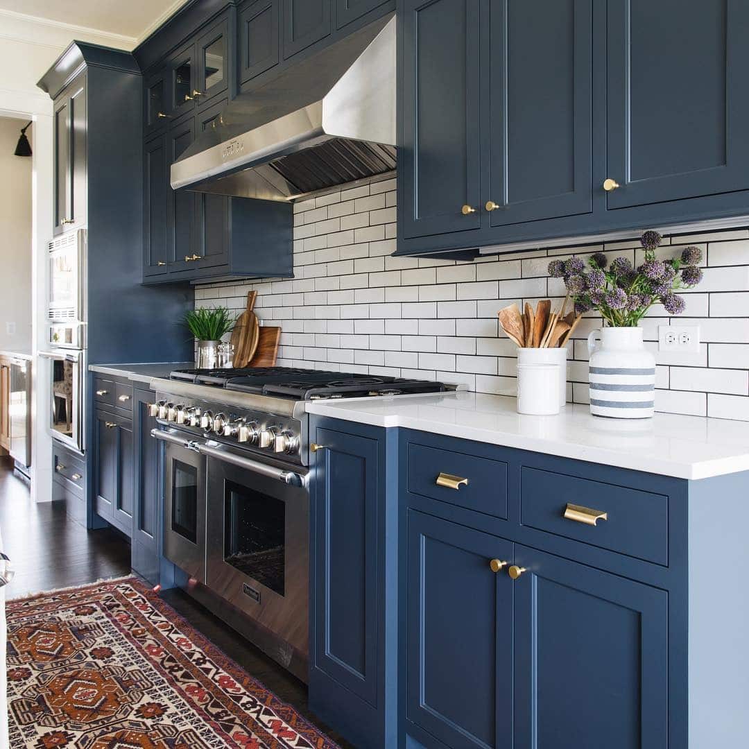 22. Classic Navy Blue Kitchen With White Subway Tile - navy blue kitchen ideas