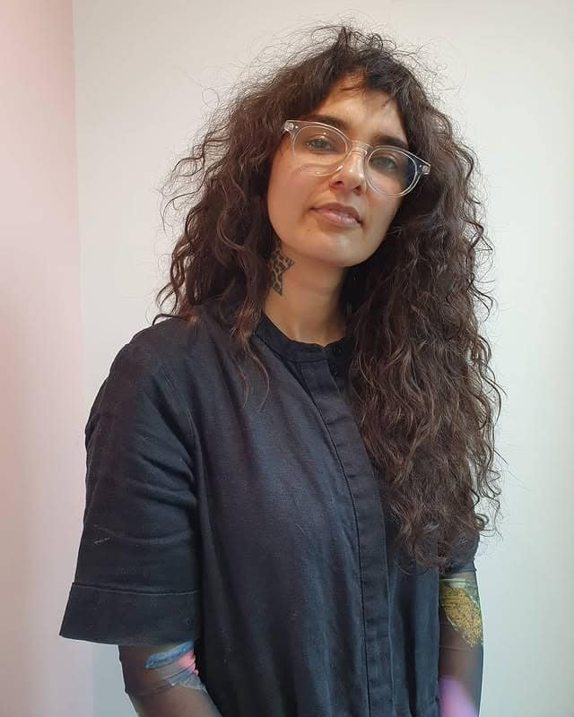 13. Dark Espresso Curly Shag with Textured Bangs - Long Shaggy Hair