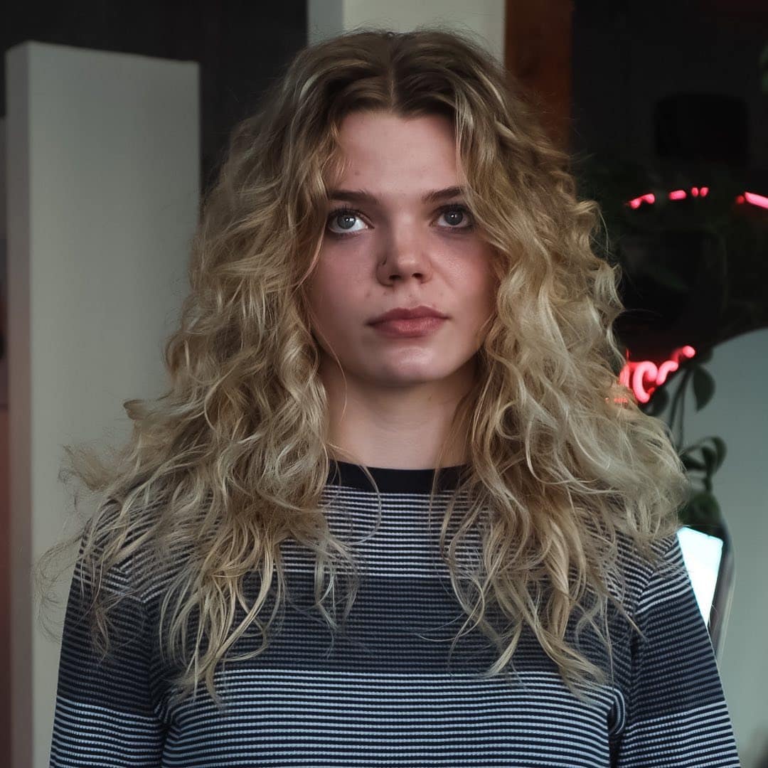 15. Ash Blonde Curly Wolf Shag - Long Shaggy Hair