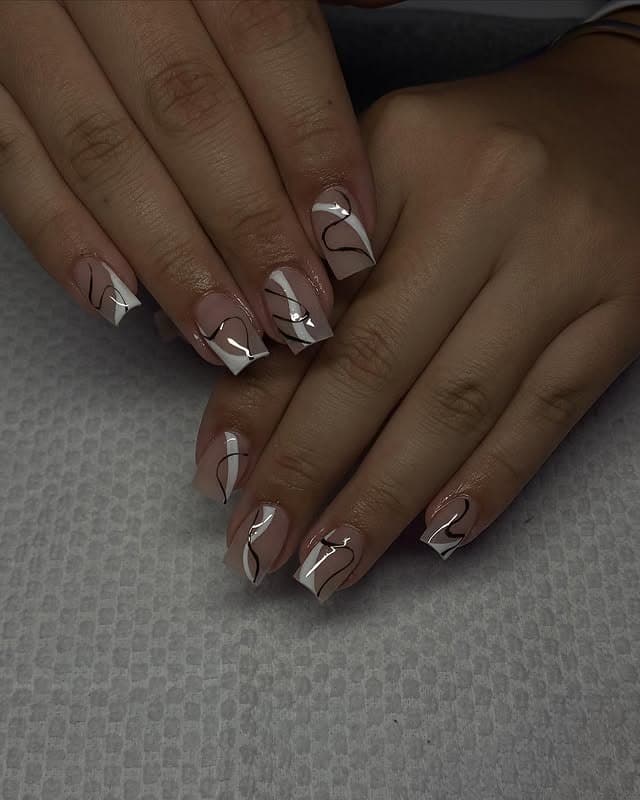 6. Minimalist Nude Swirl French Nails - short thanksgiving nail ideas