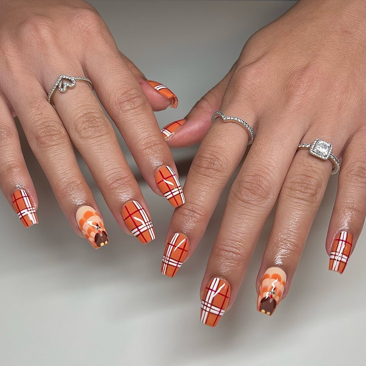 7. Pumpkin Plaid Thanksgiving Nails - short thanksgiving nail ideas