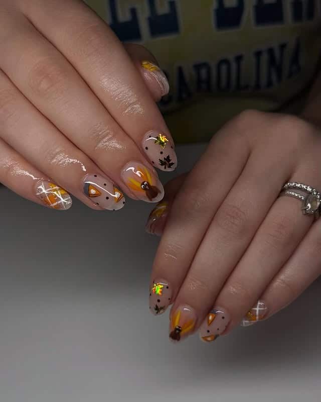 10. Pumpkin Confetti Fall Nails - short thanksgiving nail ideas