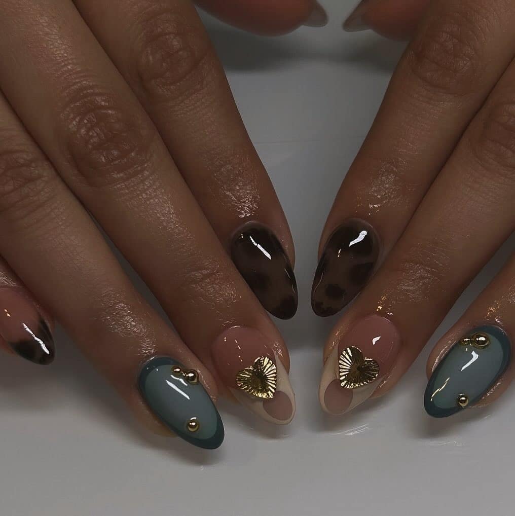 13. Teal and Chocolate Heart Accent Nails - short thanksgiving nail ideas