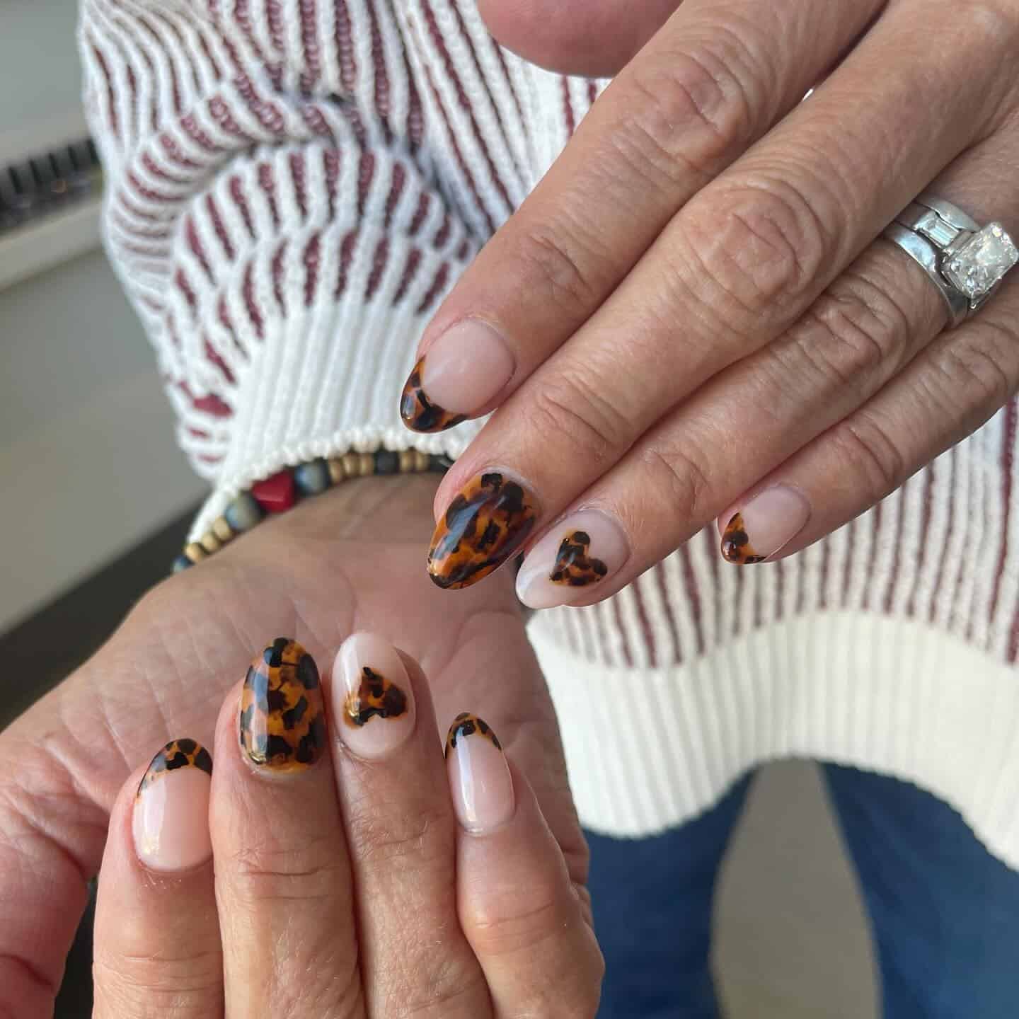 18. Tortoiseshell French Tip Nails - short thanksgiving nail ideas
