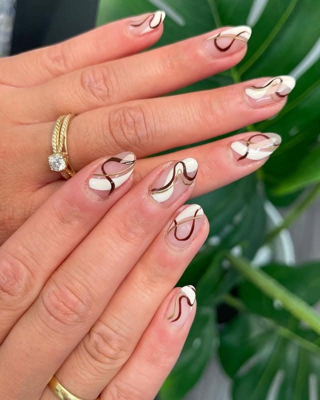 20. Abstract Mocha Swirl French Nails - short thanksgiving nail ideas
