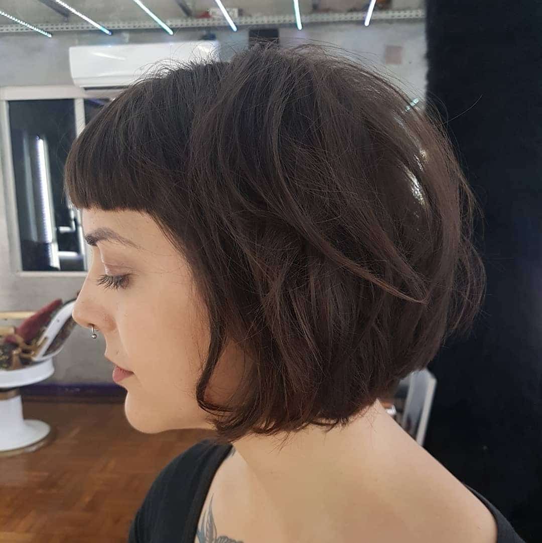 2. Textured Brunette Bob with Micro Bangs - Messy Bob Haircut