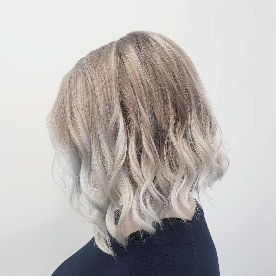 5. Pearl Blonde Wavy Bob - Messy Bob Haircut
