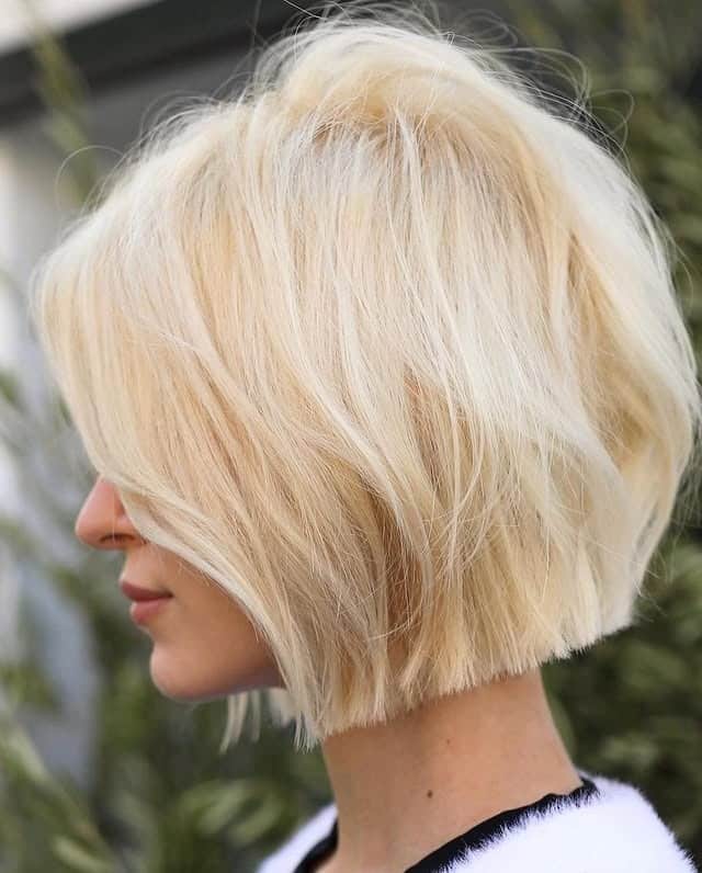 16. Creamy Platinum Layered Bob - Messy Bob Haircut