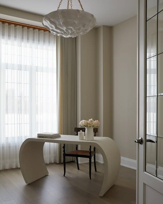 14. Sculptural Cream Minimalist Workspace - minimalist home office ideas