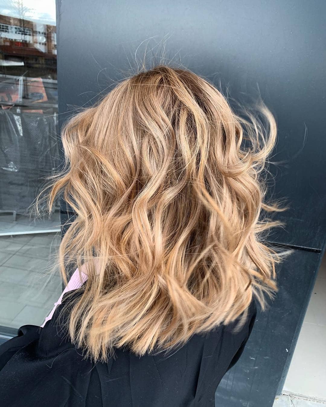 11. Creamy Toffee Blonde Beach Waves - Chocolate Toffee Hair Color
