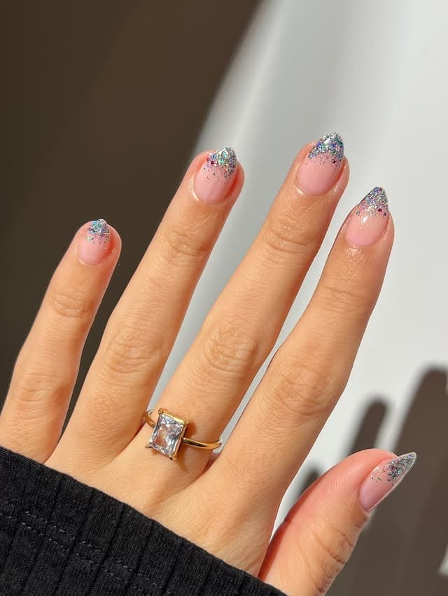 2. Silver Glitter Fade Almond Nails - cute nail ideas for short nails