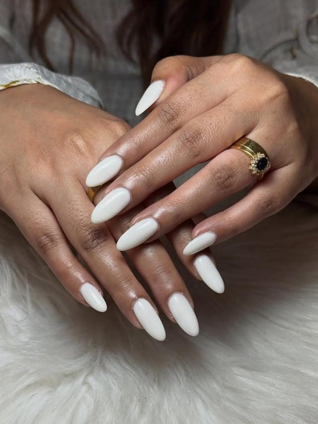 2. Classic Milky White Almond Nails - milky nail ideas