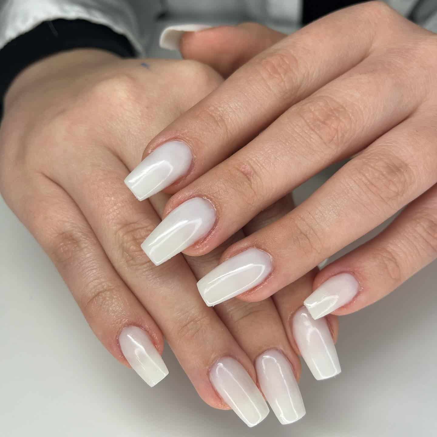 15. Milky White Coffin Nails - milky nail ideas