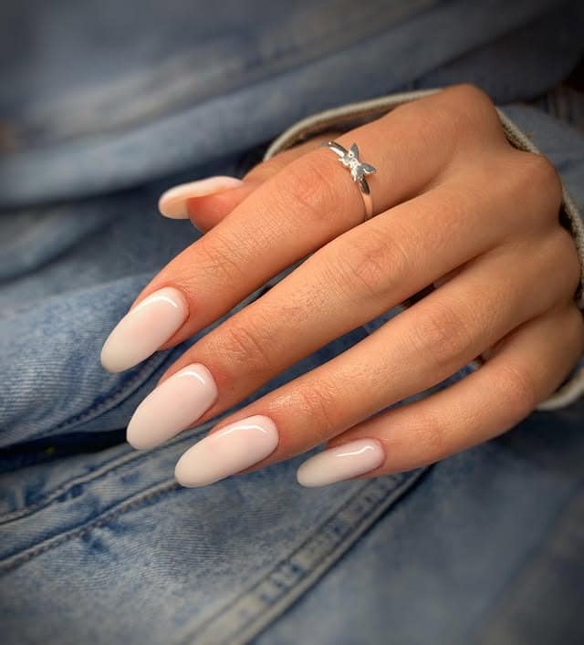 22. Milky White Almond Nails with Micro French Detail - milky nail ideas