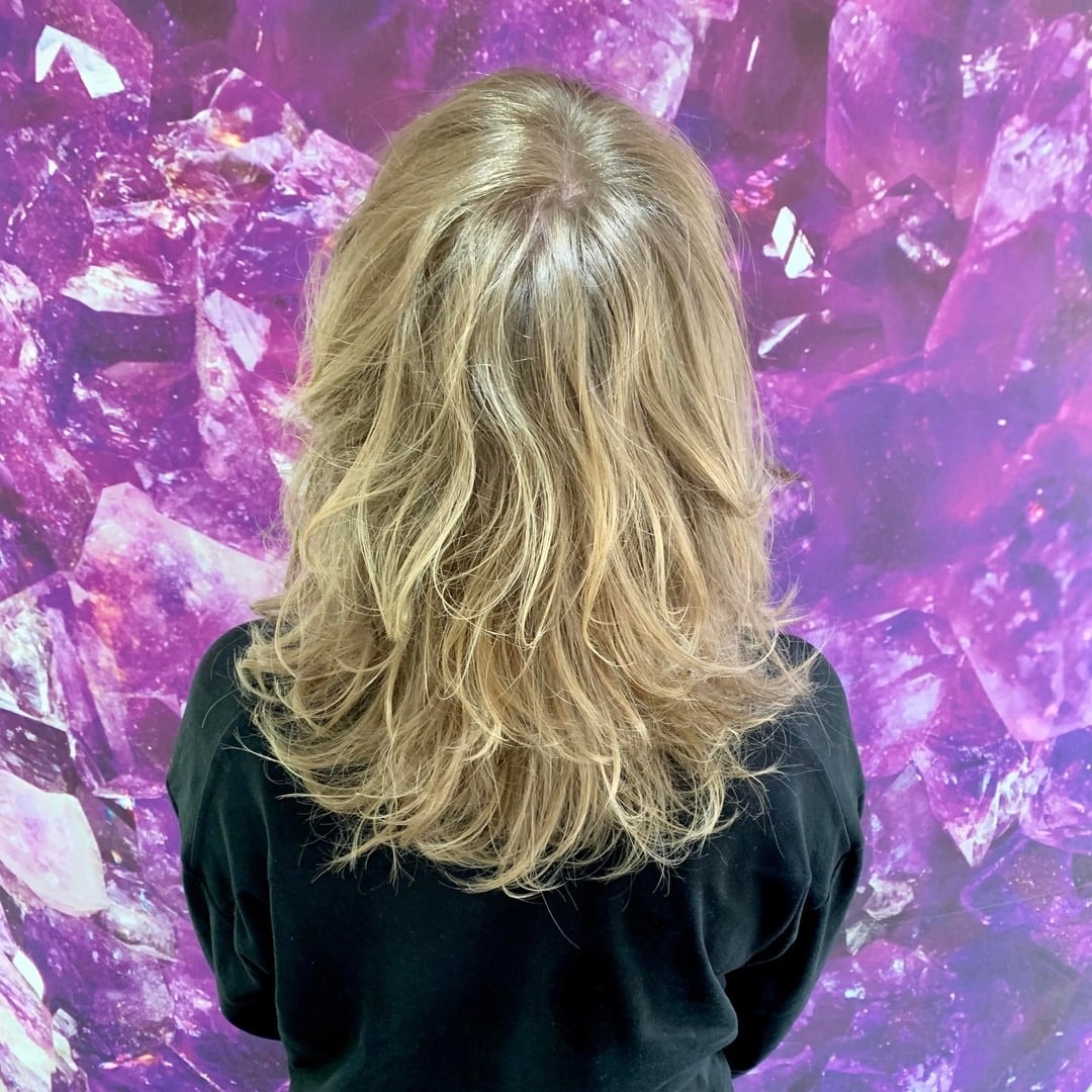7. Sandy Blonde Feathered Wolf Layers - Layered Wolf Haircut
