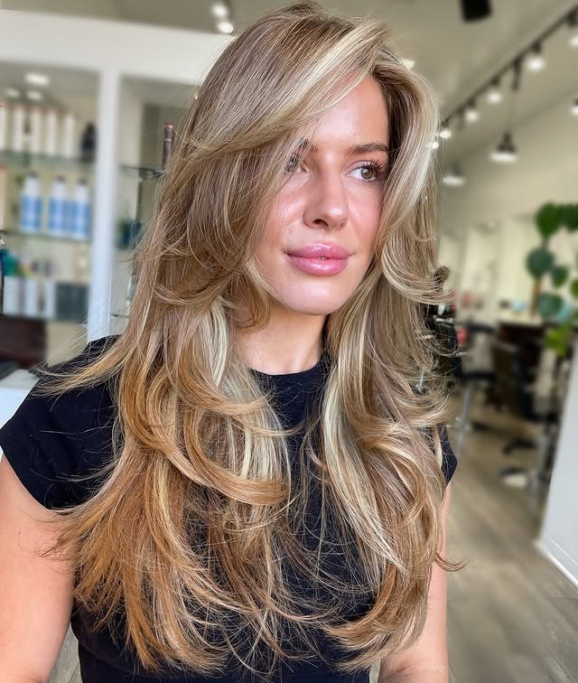19. Creamy Blonde Layered Wolf Blowout - Layered Wolf Haircut