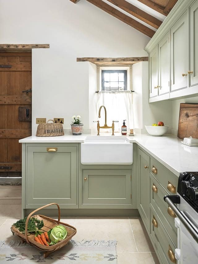 8. Farmhouse Sage Kitchen With Butler Sink - sage green kitchen ideas