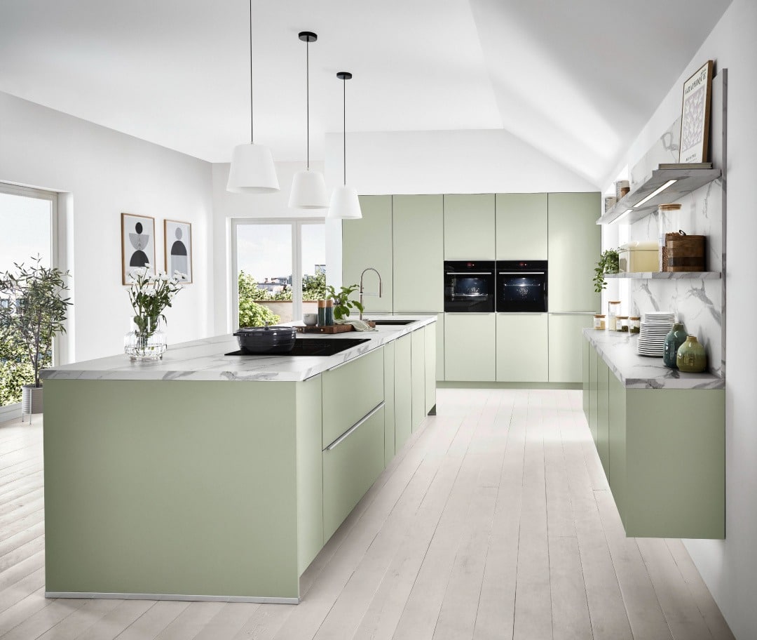 19. Modern Pale Sage Kitchen With Streamlined Storage - sage green kitchen ideas