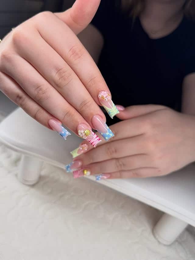 4. Pastel Swirl French Tip Coffin Nails - easter nail ideas