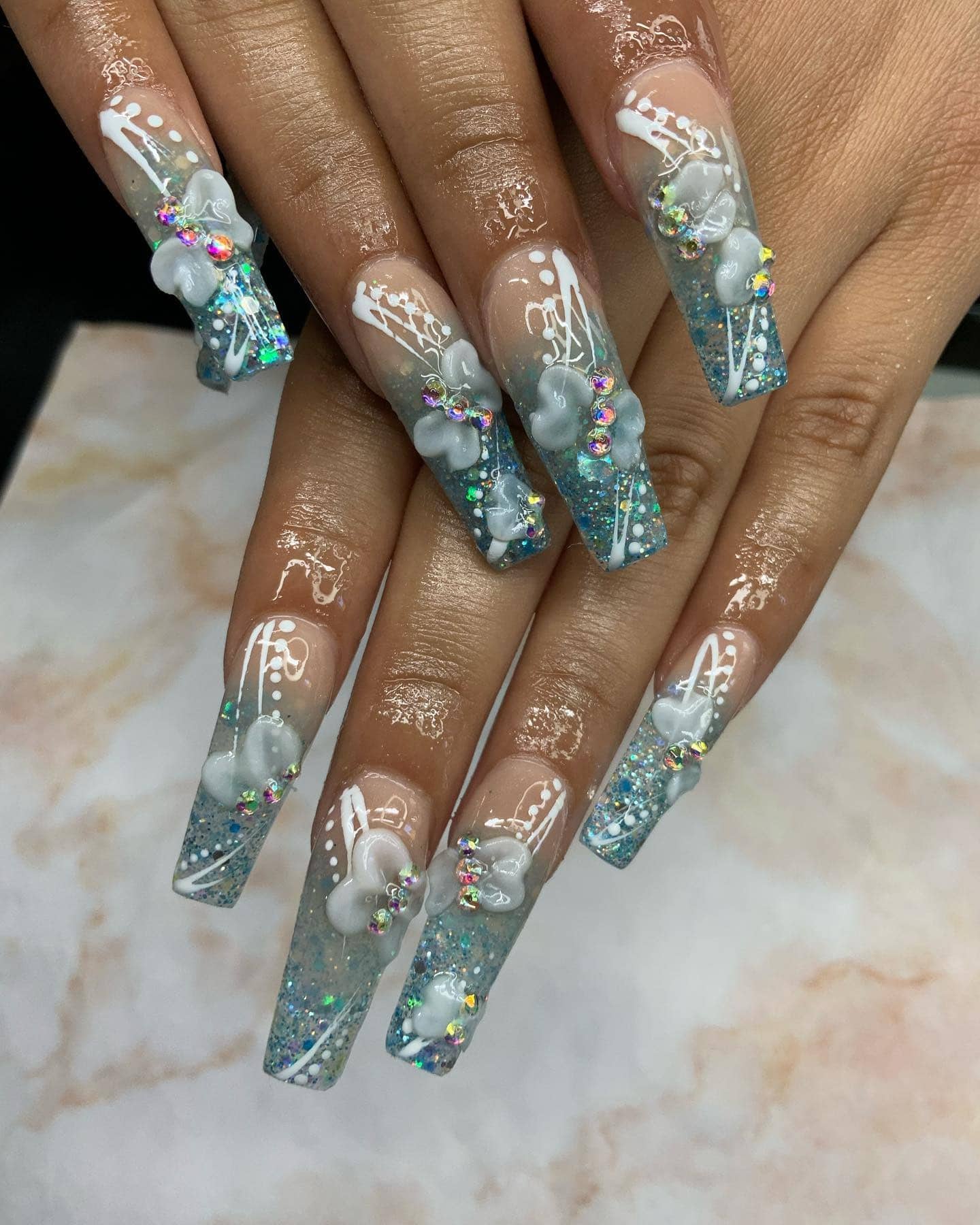 11. Icy Blue Glitter Coffin Nails with 3D Flowers - easter nail ideas