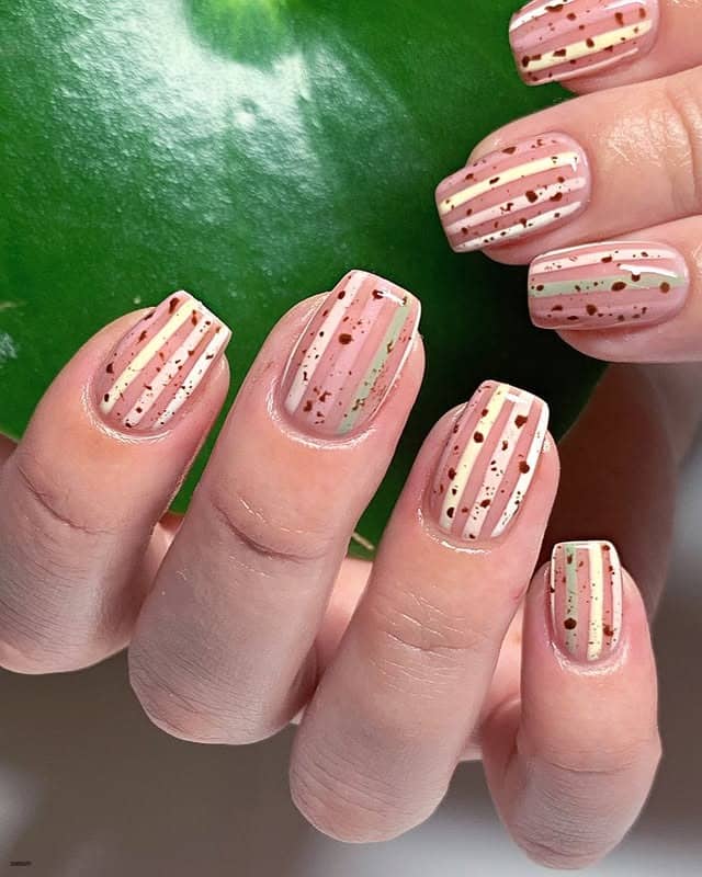 12. Pink Speckled Stripe Easter Nails - easter nail ideas