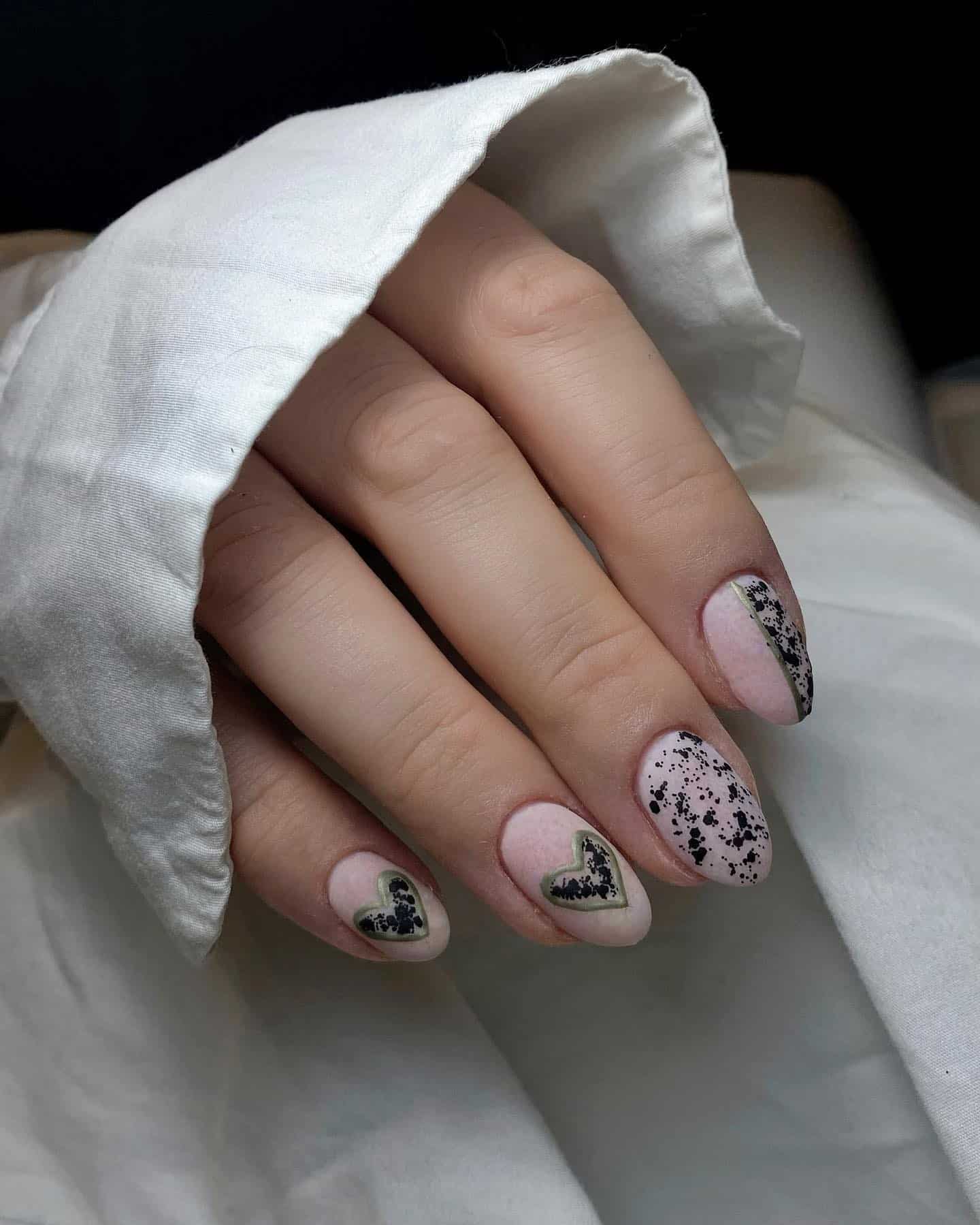 21. Speckled Heart Almond Nails in Soft Pink and Sage Green - easter nail ideas