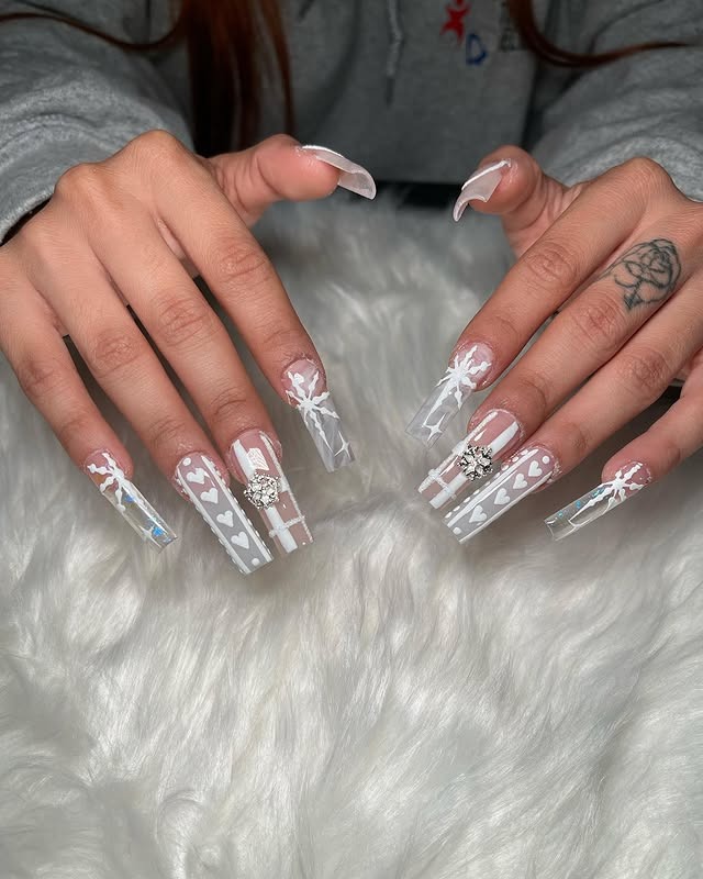 9. Icy White Snowflake Clear Coffin Nails - winter birthday nail ideas