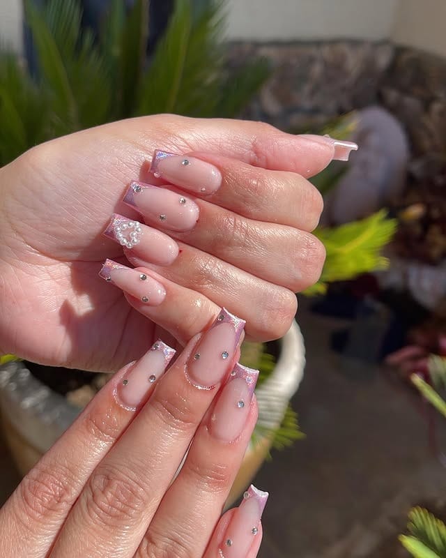 10. Nude Pink Rhinestone French Tip Nails - winter birthday nail ideas