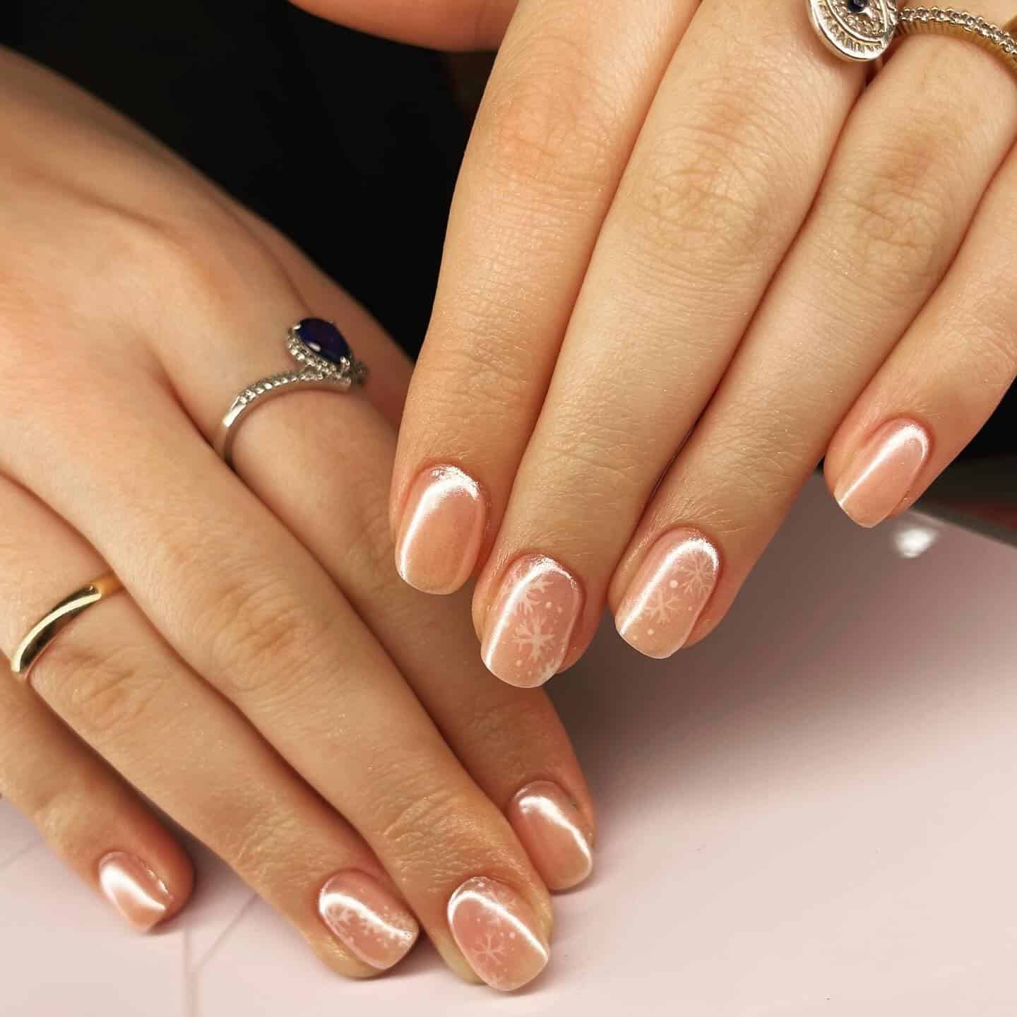 13. Pearl Chrome Snowflake Short Nails - winter birthday nail ideas