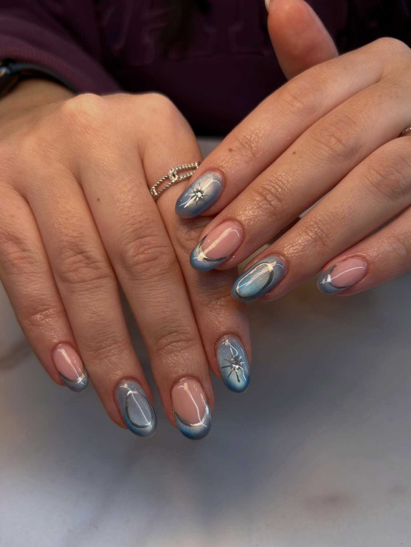 22. Metallic Blue Chrome Almond Nails - winter birthday nail ideas